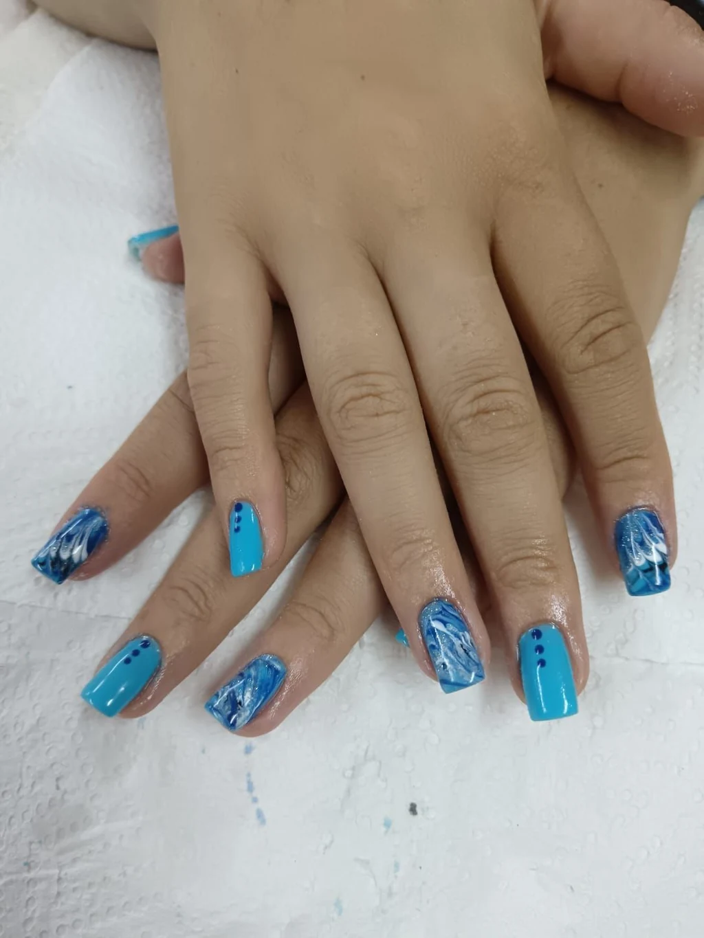 Nails done at Neon Moon Nail & Beauty, Sasolburg: sky blue with navy marble and dots
