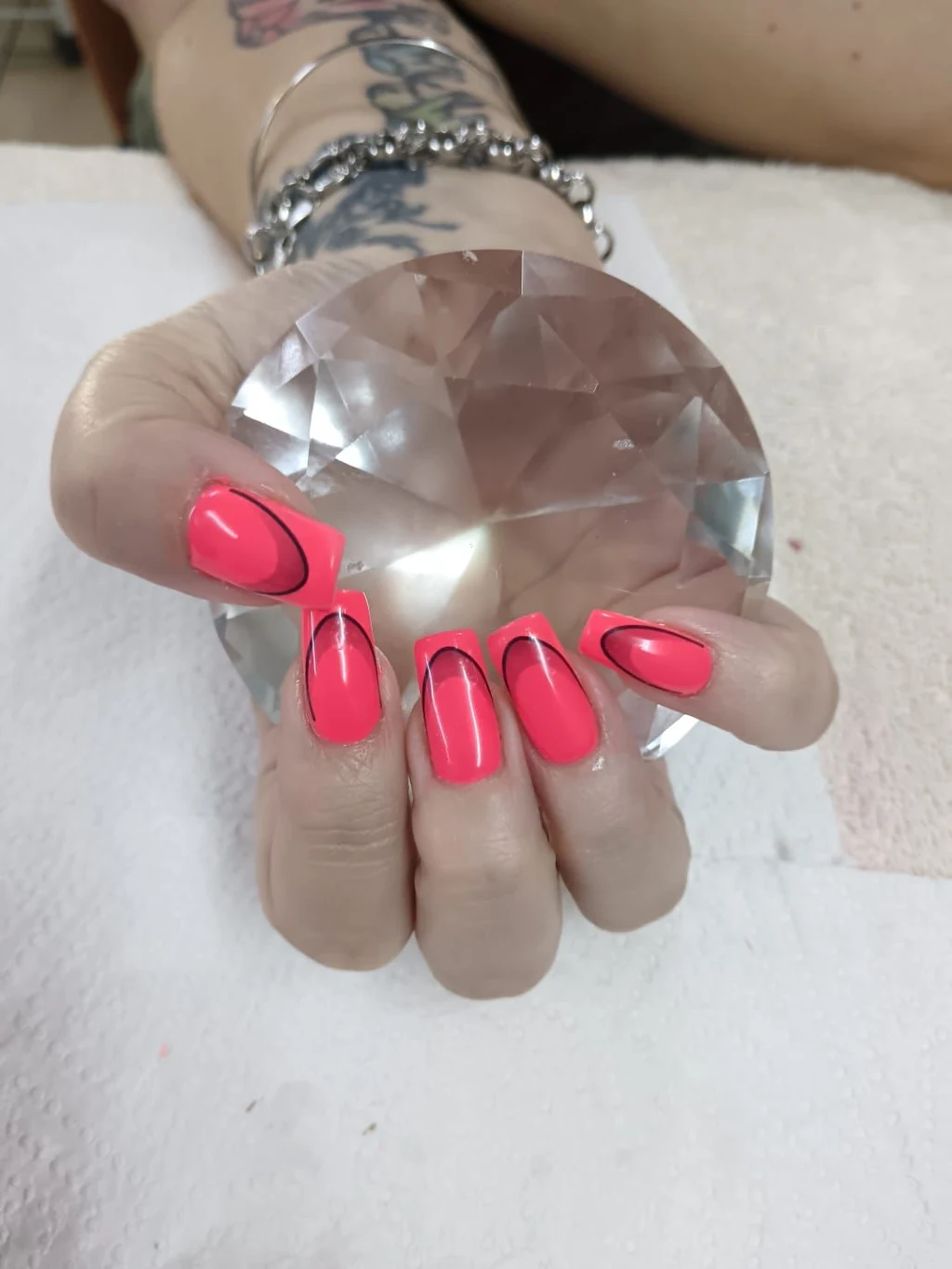 Nails done at Neon Moon Nail & Beauty, Sasolburg: coral with a fine black outline