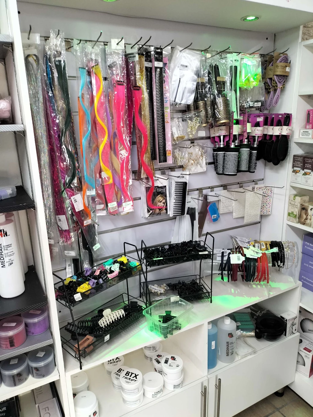 Inside the Neon Moon shop in Sasolburg: clip-in colour and extensions