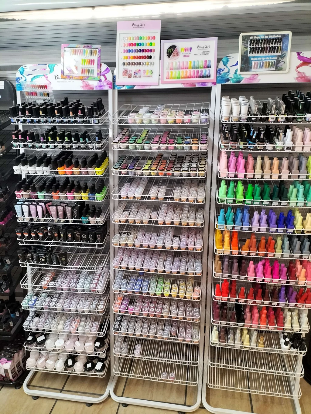 Racks of gel polish in every colour inside the Neon Moon shop