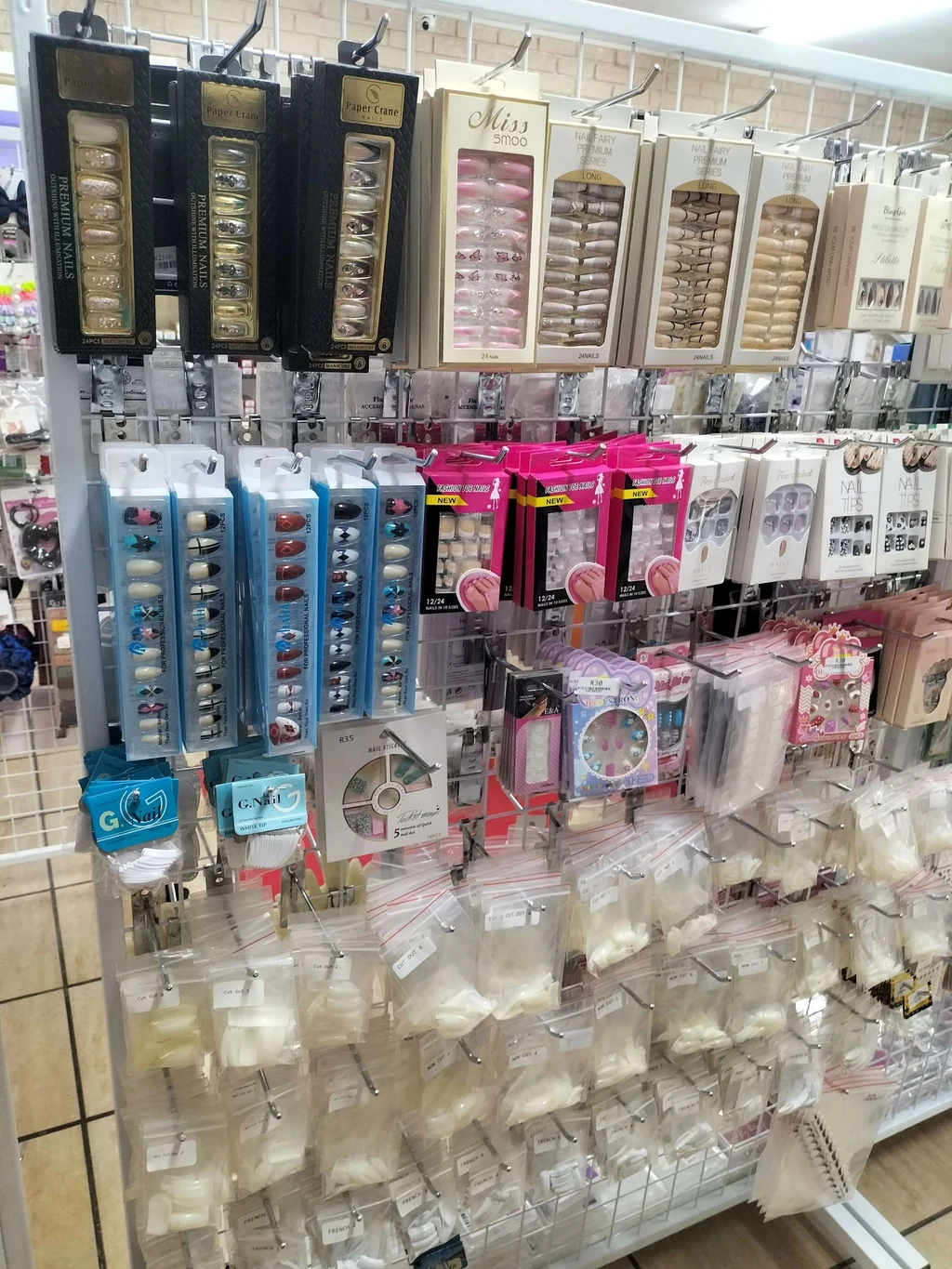 Inside the Neon Moon shop in Sasolburg: nail tips and press-ons